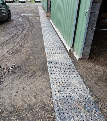 Long narrow drain at entrance of ware house